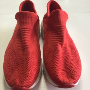 Women’s Orange pull on sneakers Size 10